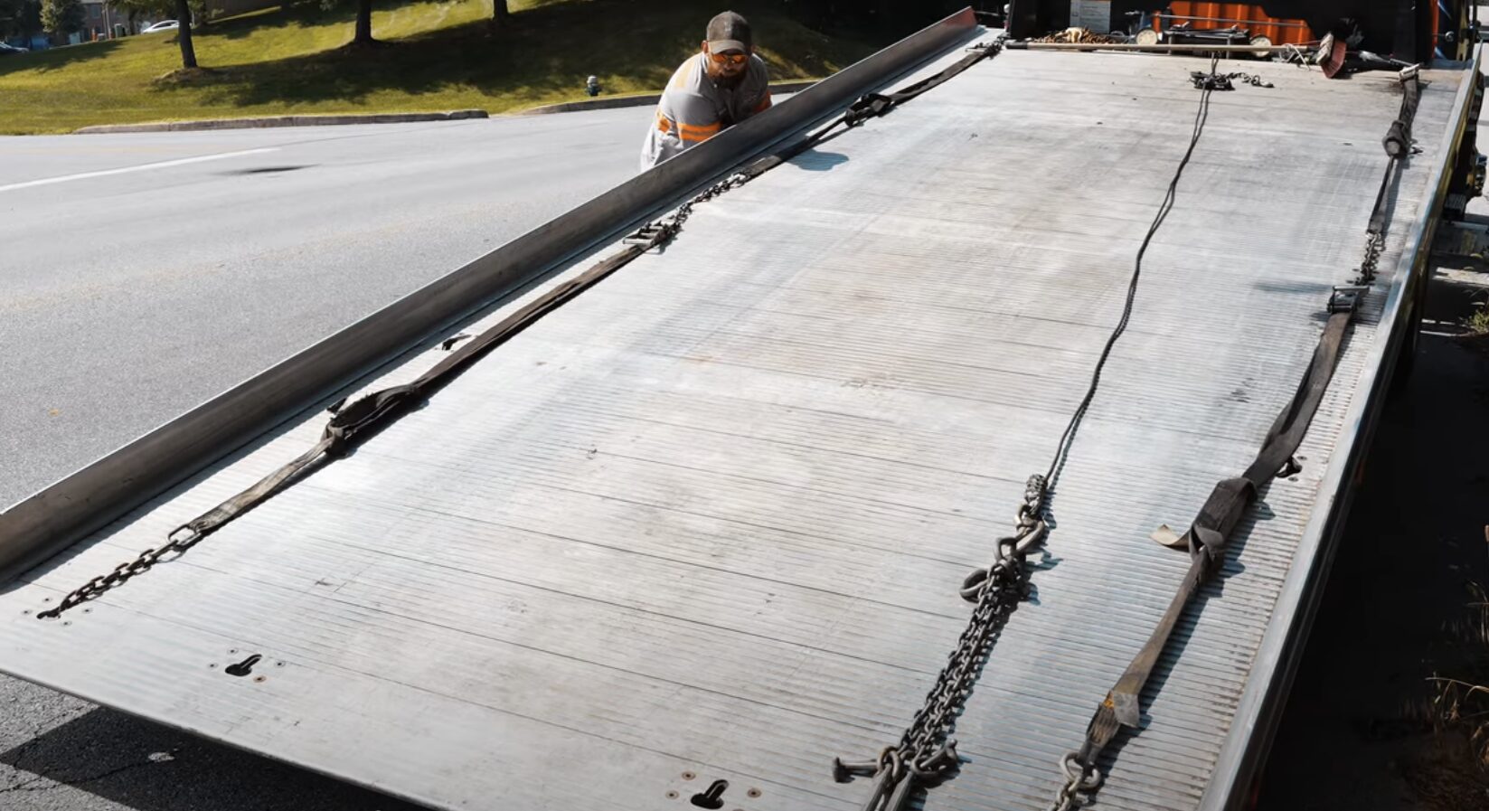 Professional Towing Equipment - Papillion Towing Service Professional flatbed tow truck with chains and equipment ready for emergency towing service